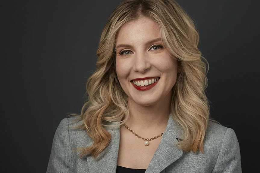 Professional headshot of Monica, wealth management professional